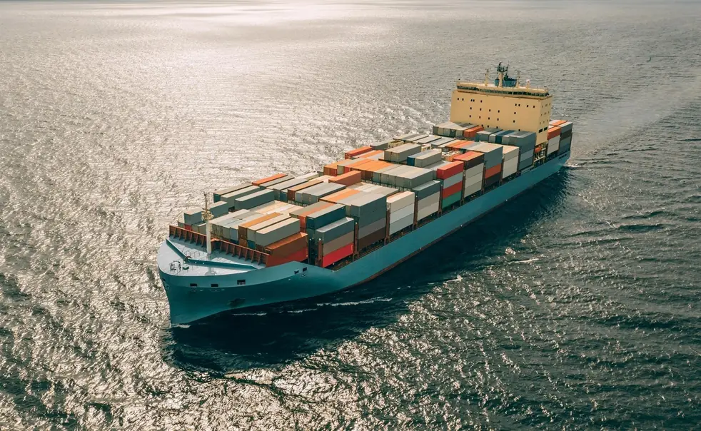 Container ship sailing on the open sea