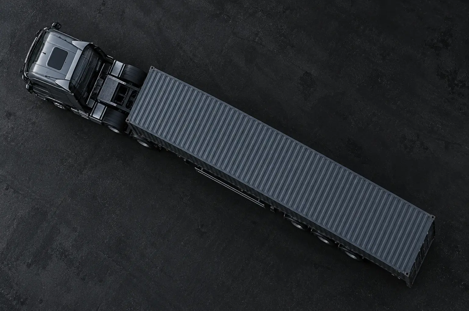 Aerial view of a truck hauling a container